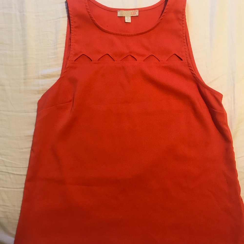Cute orange top with triangle cutouts! - Picture 2 of 4